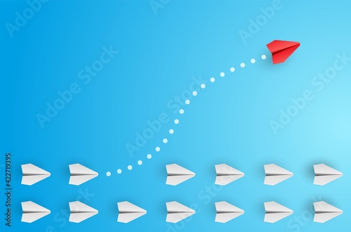 Individuality concept. Individual and unique leader red paper plane flies to the side. Vector