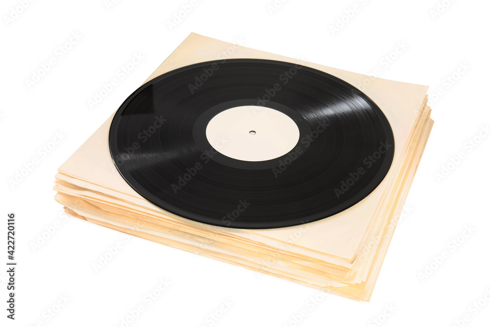 Fototapeta premium Stack of vintage vinyl records on white background