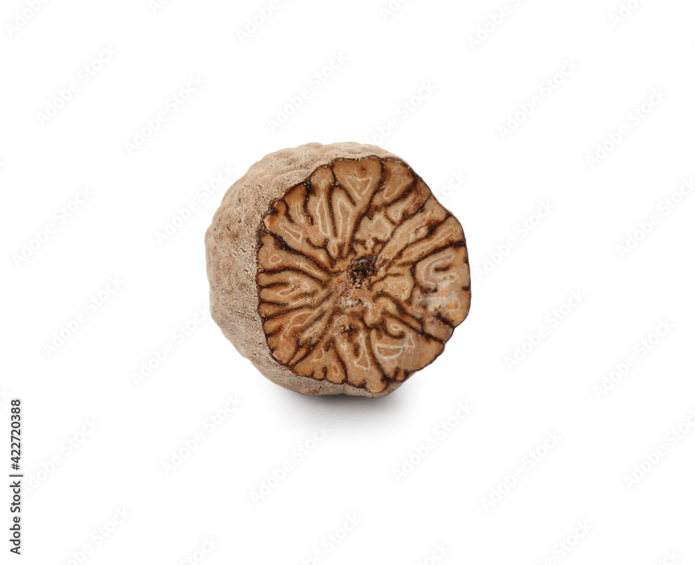 Piece of nutmeg seed isolated on white Piece of nutmeg seed isolated on white