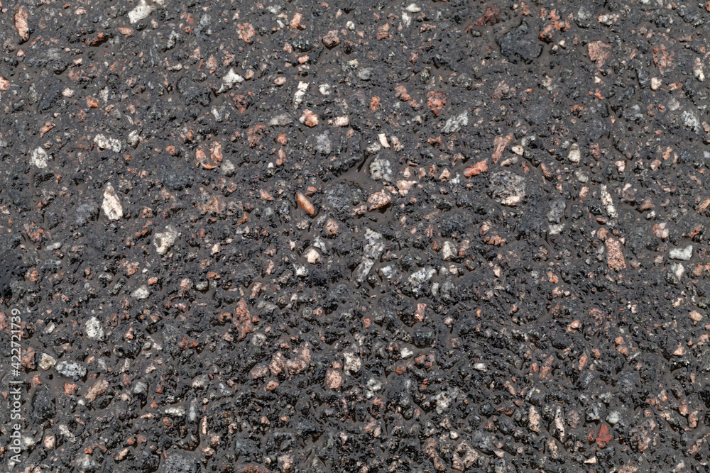 Wet road surface. Tarmac texture, dark road Wet road surface. Tarmac texture, dark road