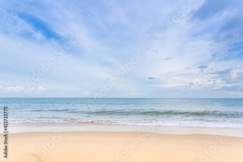 White cloud  blue sky and sea with green land as the sea view in natural background.