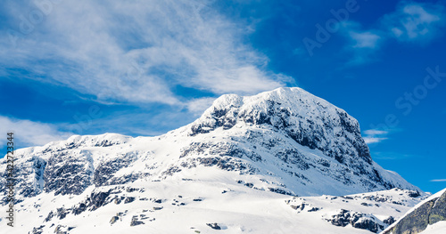 Spectacular view of a snow capped mount Bitihorn peak in Beitost  len in Norway on a sunny winters day.
