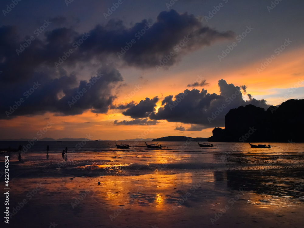 Sunset over sea shore beach in Thailand