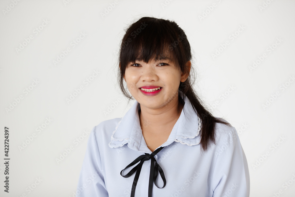 Portrait of a young teen Asian woman with smile face on white background Portrait of a young teen Asian woman with smile face on white background