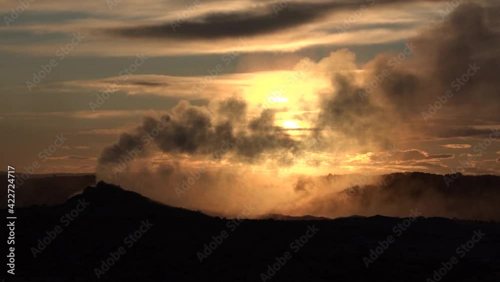 Iceland. Geothermal field. Smoking fumarole. Iceland. Geothermal field. Smoking fumarole.