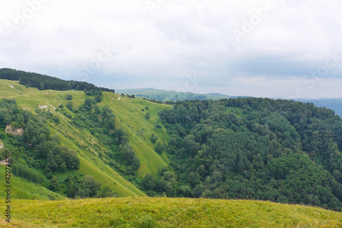 Marvellous view of slopes, meadows and forests in foothills of North Caucasus.