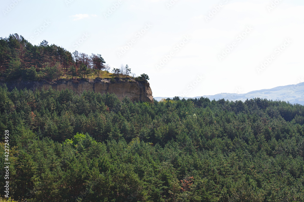 Amazing landscape with rock and forest in the foothills of North Caucasus.