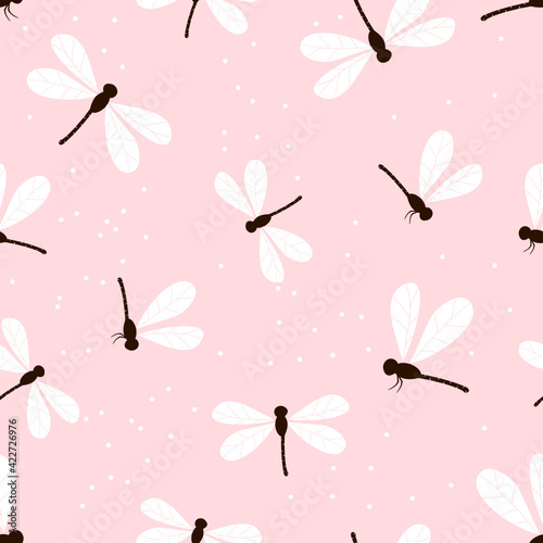 Seamless pattern with dragonfly cartoon and dotss on pink background vector illustration.