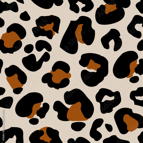 Animal print skin seamless pattern. Leopard spotted fur imitation in cartoon style