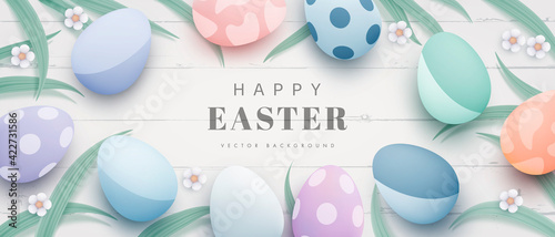 Happy Easter design with realistic eggs and grass on light wooden background. Festive spring 3d composition. Horizontal background for web banner, poster, cover and brochure