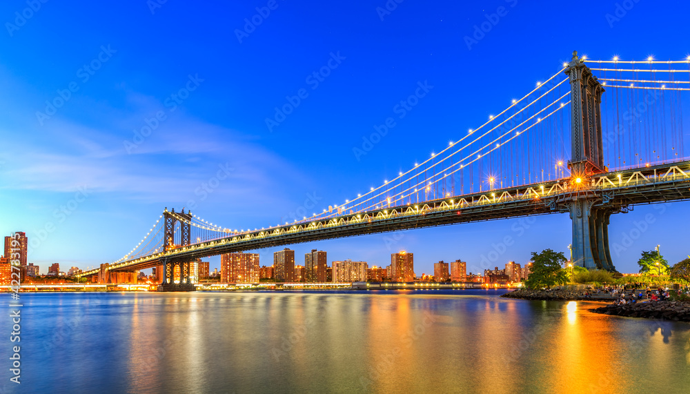 Manhattan Bridge in New York City. is a suspension bridge that crosses the East River in New York City, connecting Lower Manhattan with Downtown Brooklyn.