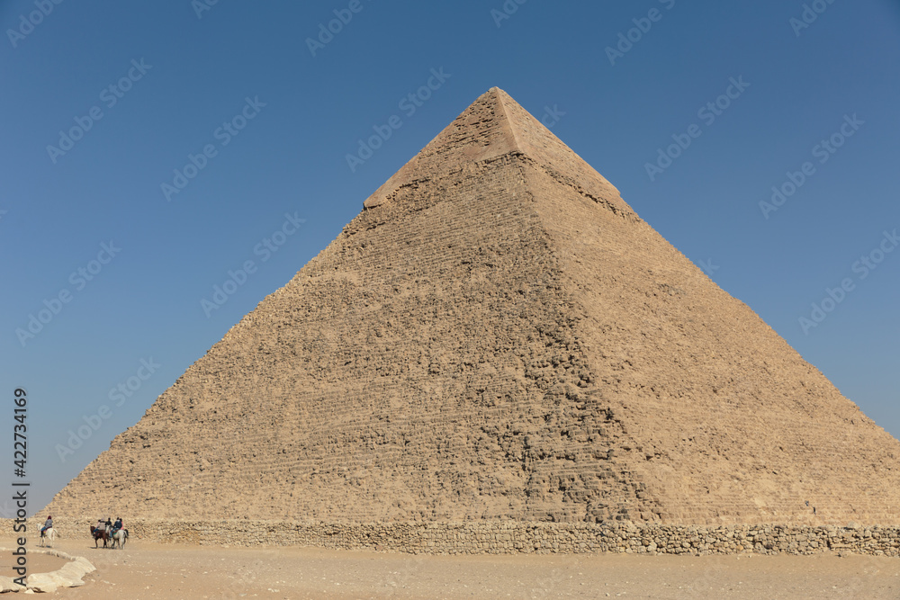 Horse riding along the Great Pyramid of Giza. Horse riding along the Great Pyramid of Giza.