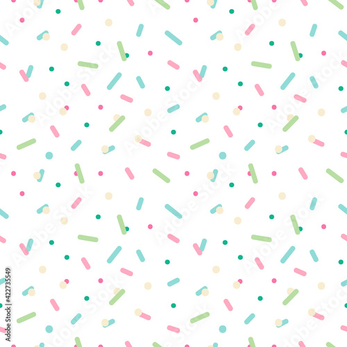 Colorful confetti, sprinkles, dots vector seamless pattern background for party, celebration design.