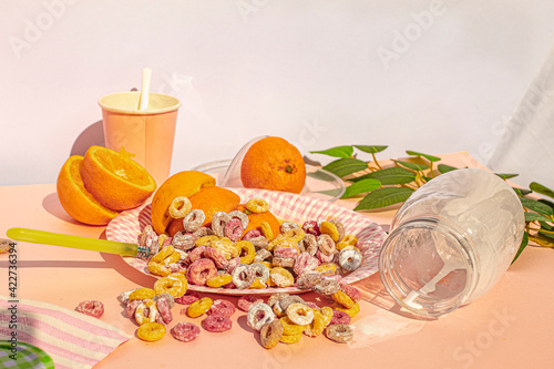 Studio shot of disastrous breakfast at vintage kitchen with colors cereals with milk and oranges