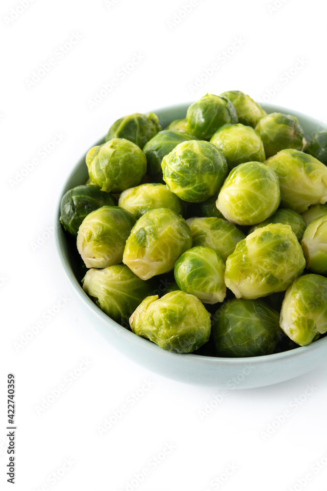 Set of brussel sprouts in a bowl isolated on white background Set of brussel sprouts in a bowl isolated on white background