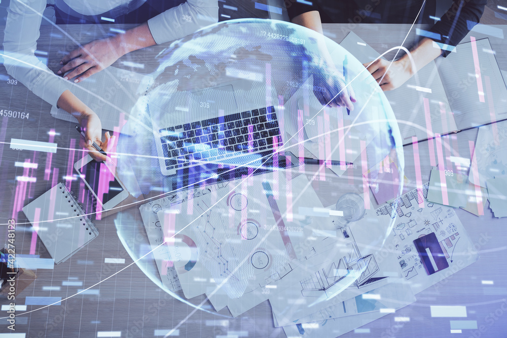 Double exposure of woman hands working on computer and forex graph hologram drawing. Top View. Financial analysis concept. Double exposure of woman hands working on computer and forex graph hologram drawing. Top View. Financial analysis concept.