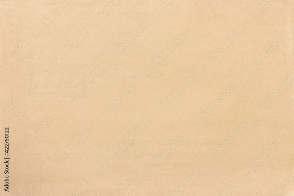 The light texture of old, yellowed paper, covered with traces of ink stains.
