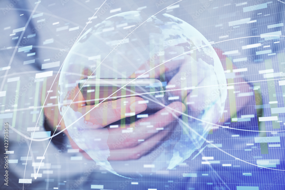 Double exposure of man's hands holding and using a phone and international business theme drawing. Double exposure of man's hands holding and using a phone and international business theme drawing.