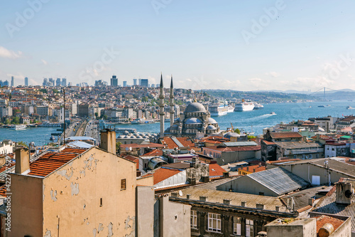 View of the New Mosque  the Bosphorus and the Ataturk Bridge from the roof of Buyuk Valide Sultan Khan. Istanbul. Turkey.