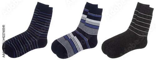 Three pairs of stripe cotton-blend socks of blue and grey colors isolated on a white background