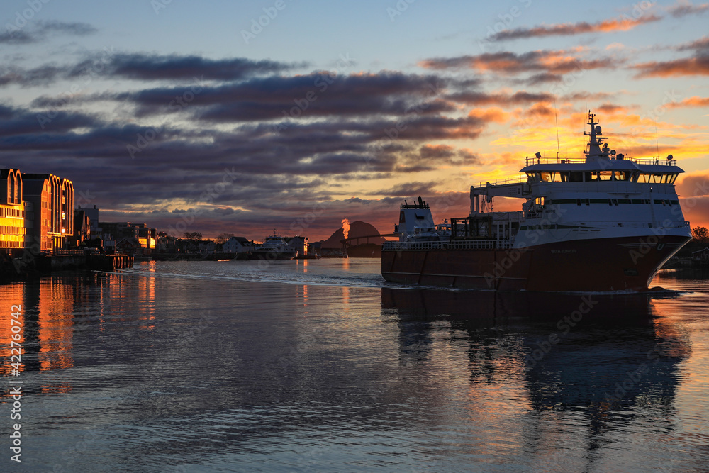 Cargo ship pas in sunset,Brønnøysund,Helgeland,Nordland county,Norway,scandinavia,Europe