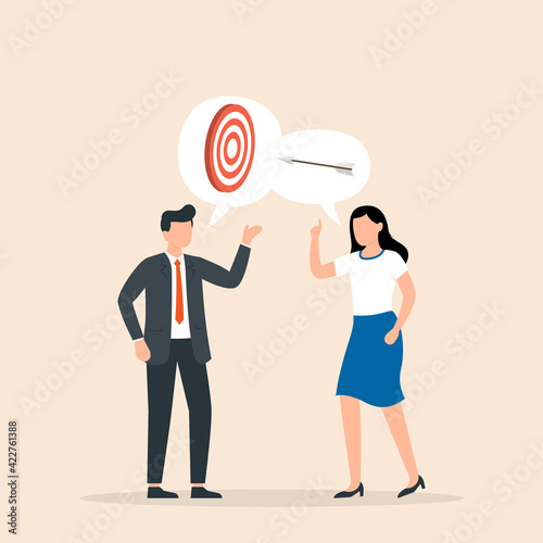 Businessman and woman talk about the business goals. Business team shared goals achievement.