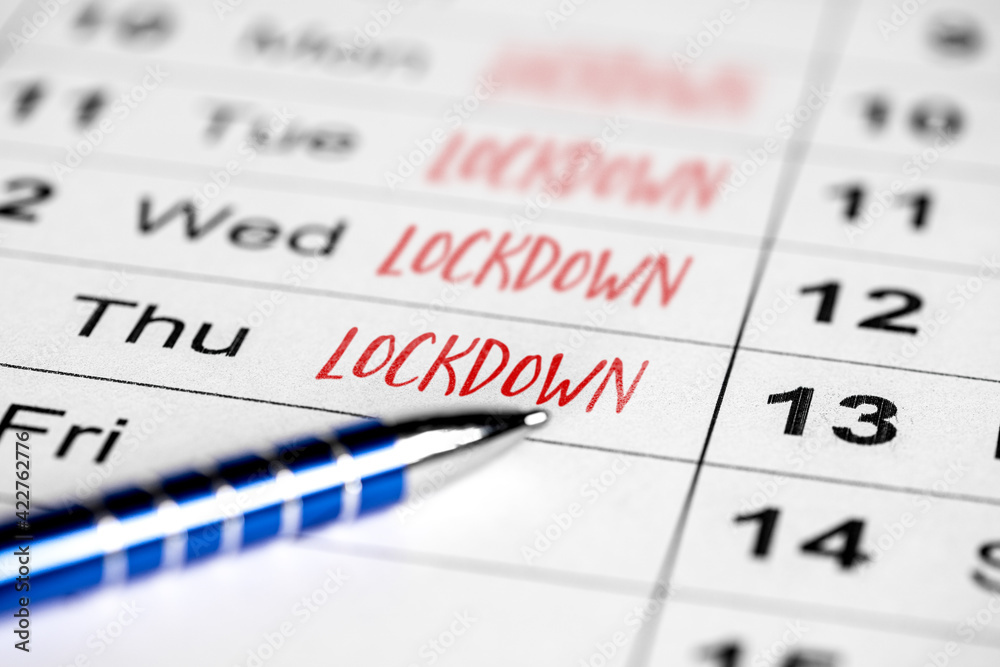 Calender with handwriting words Lockdown, law and measures Calender with handwriting words Lockdown, law and measures