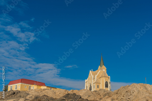 Beautiful panoramic view of the old protestant german colonial church Felsenkirche in Luederitz, Luderitz in Namibia photo