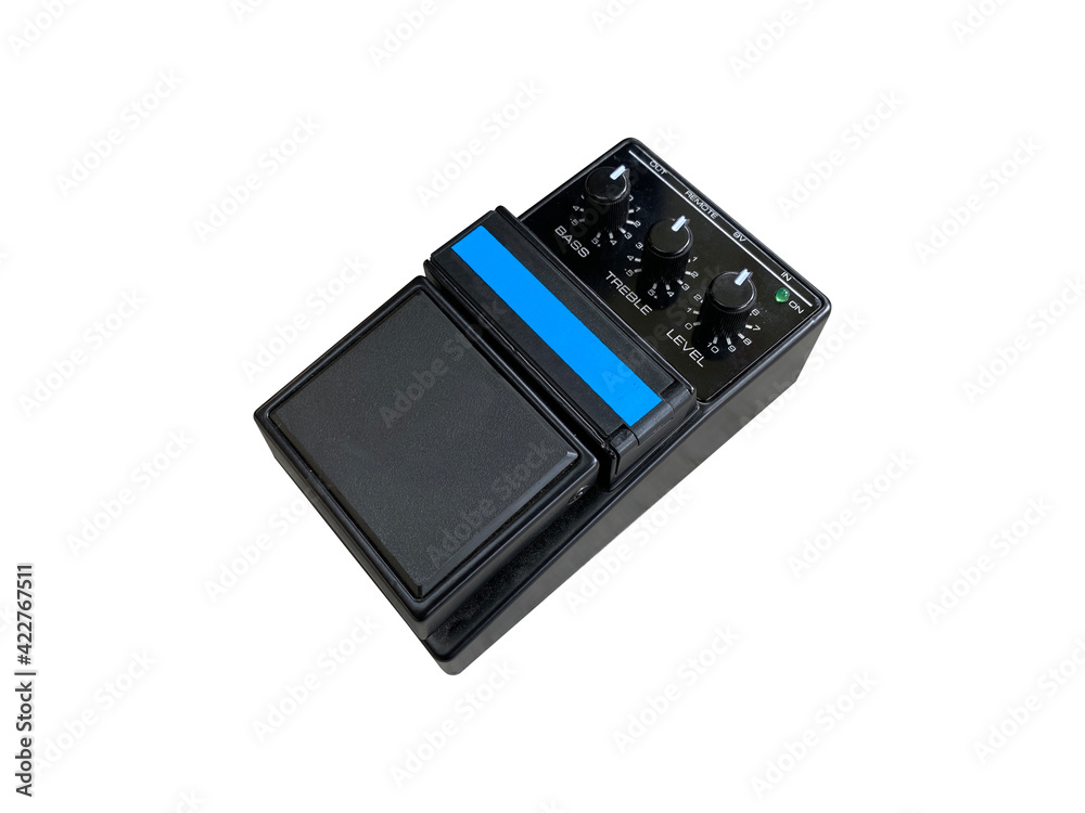 Isolated Black overdrive and black knob pre-amplifier stompbox electric guitar effect on white background with clipping path. music concept. can use for flat lay graphic or promotion. Isolated Black overdrive and black knob pre-amplifier stompbox electric guitar effect on white background with clipping path. music concept. can use for flat lay graphic or promotion.
