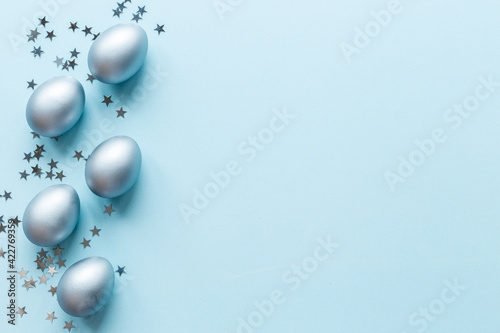 Silver Easter eggs with decoration. Wealth and good luck concept.