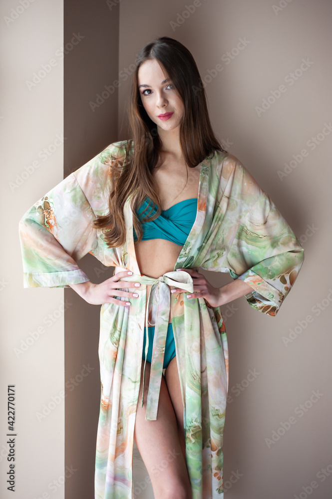 Woman in pareo. Beachwear. Beautiful tender woman posing Woman in pareo. Beachwear. Beautiful tender woman posing