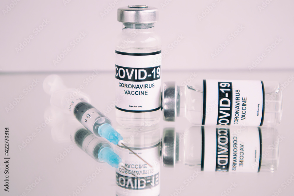 Covid-19 coronavirus vaccine on the white background Covid-19 coronavirus vaccine on the white background