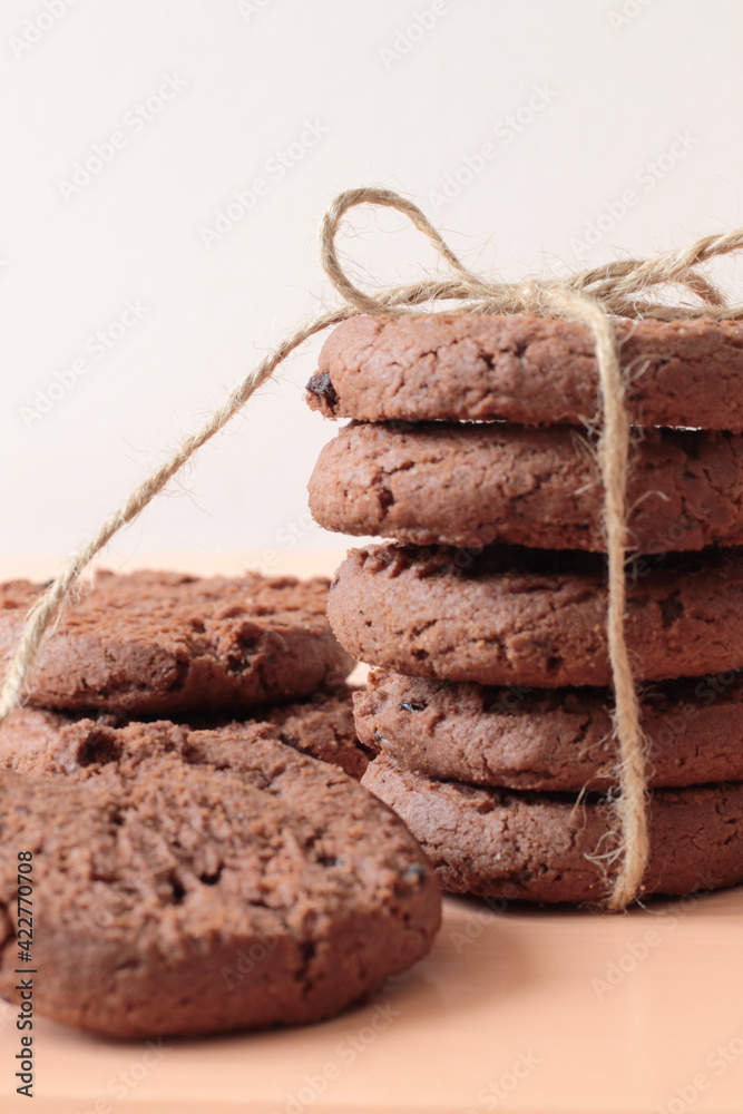 stack of tasty chocolate cookies with ribbon stack of tasty chocolate cookies with ribbon