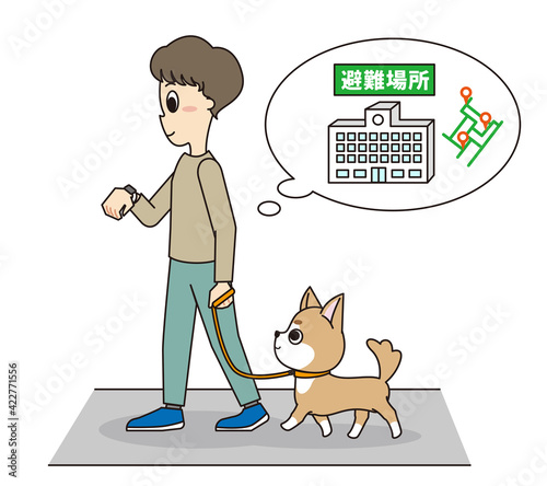 ペットの愛犬と災害からの避難までの時間を測る男性