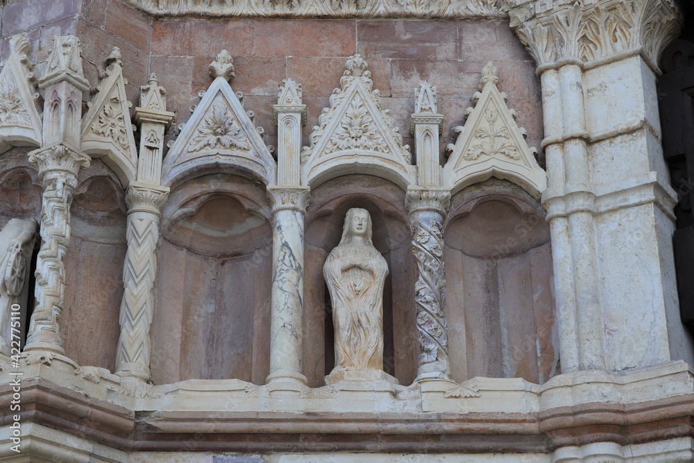 L'Aquila Medieval Church Facade Sculpted Detail with Statue in Abruzzo, Italy