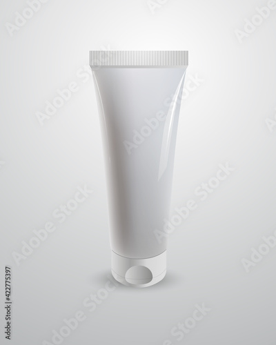 Glossy plastic tube mock up. Vector realistic cosmetic packaging on light gray background. Container for cream, gel or other skincare product