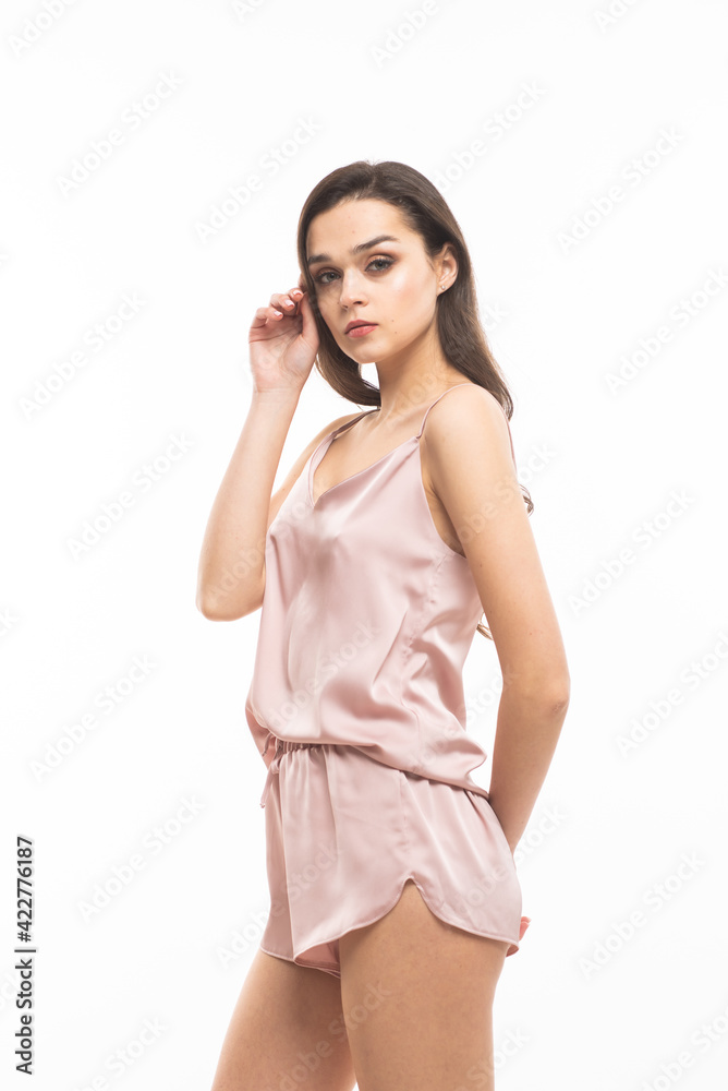Beautiful caucasian woman in silk nightwear Beautiful caucasian woman in silk nightwear