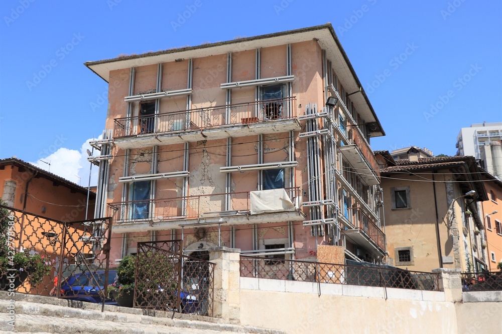 Secured Pink House Facade after Earthquake in L'Aquila, Central Italy Secured Pink House Facade after Earthquake in L'Aquila, Central Italy