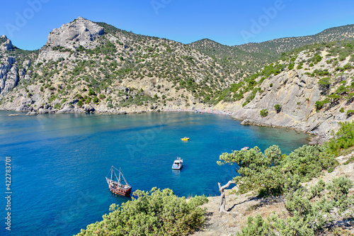 Black Sea coast, Crimea. View on Blue bay, Tsarskiy beach. on the tourist route Golitsyn trail. Botanical reserve New World. photo