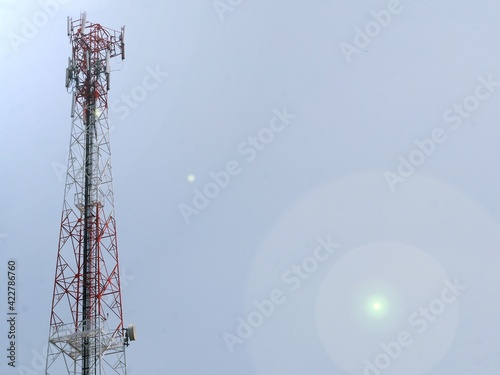 Telephone towers used to broadcast signals at dusk.