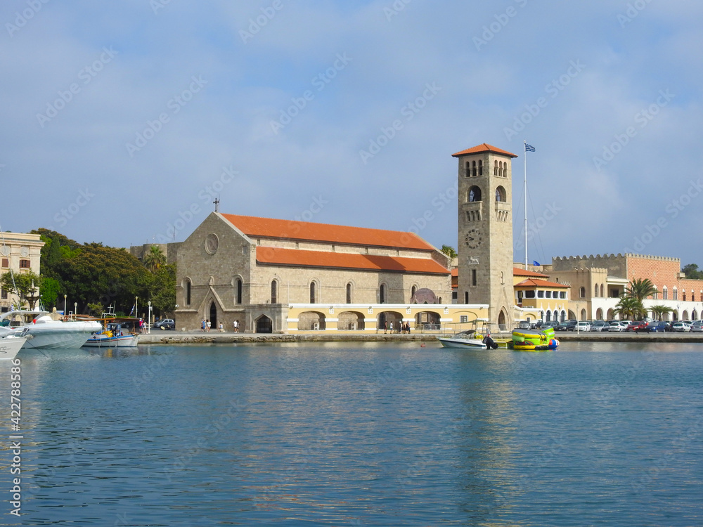 Sea water and a view of the church with the tower
