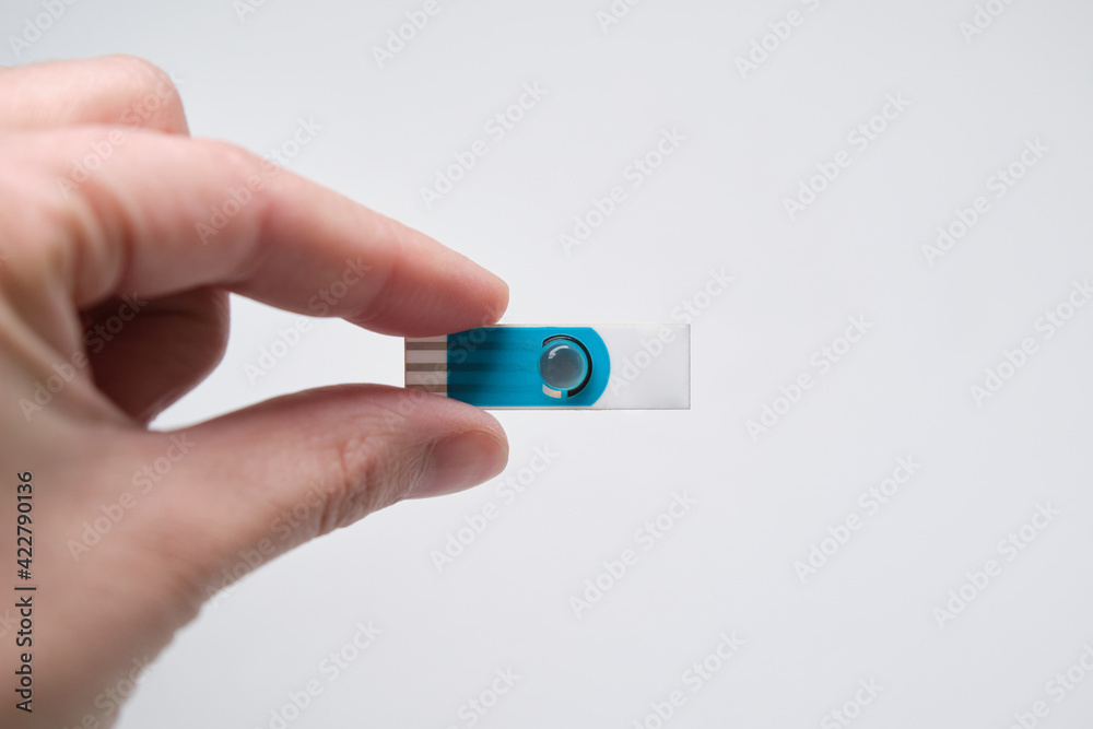 Hand holding biomaterial 3D printed onto a nano electrode. New technology approach concept. Hand holding biomaterial 3D printed onto a nano electrode. New technology approach concept.