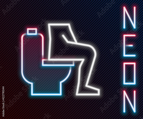 Glowing neon line Men sitting on the toilet and Constipation are experiencing severe abdominal pain icon isolated on black background. Colorful outline concept. Vector