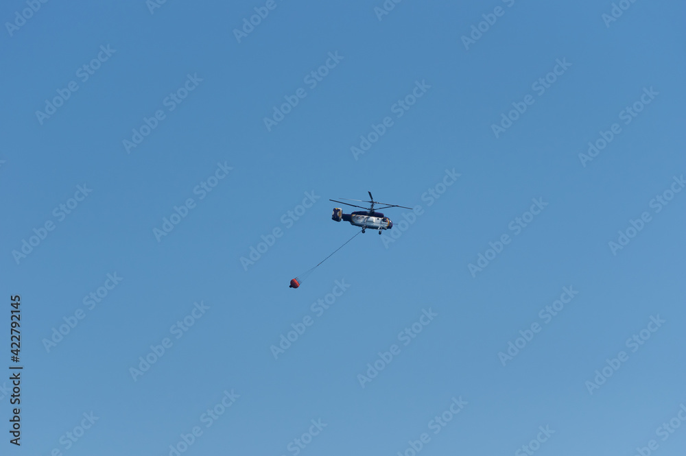 Fire Fighting and Rescue Helicopter on the sky Fire Fighting and Rescue Helicopter on the sky