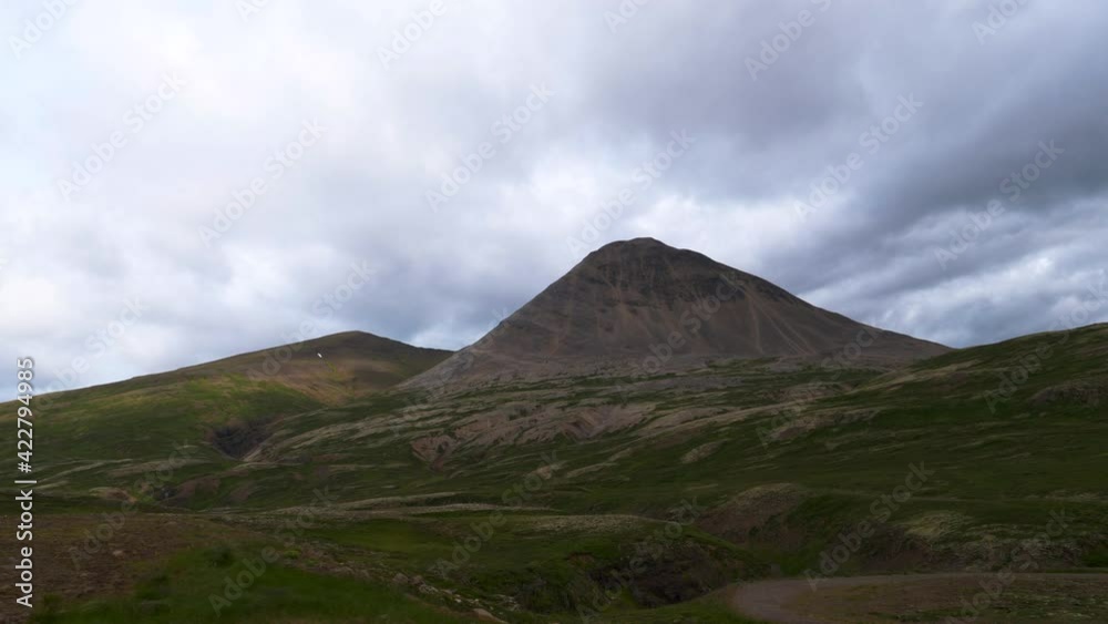 POV view of mountains and Icelandic highlands while driving, dark, cloudy day POV view of mountains and Icelandic highlands while driving, dark, cloudy day