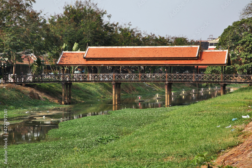 Covered pedestrian bridge over Siem Reap river in Siem Reap (Siemreap). Cambodia Covered pedestrian bridge over Siem Reap river in Siem Reap (Siemreap). Cambodia
