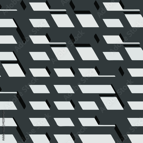 Mosaic consists of black and white geometric shapes.