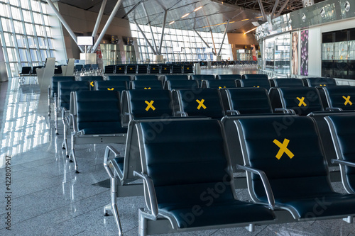 Принти на полотні A lot of seats in the airport's international terminal are completely empty