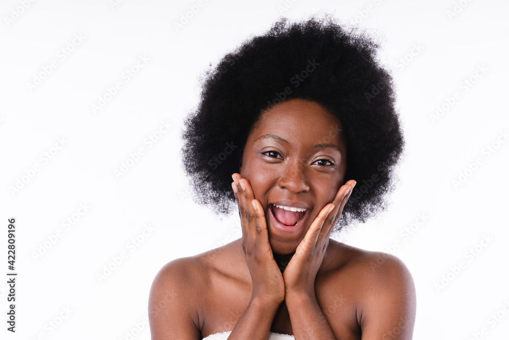 Extremely happy african girl in spa towel isolated in white background Extremely happy african girl in spa towel isolated in white background