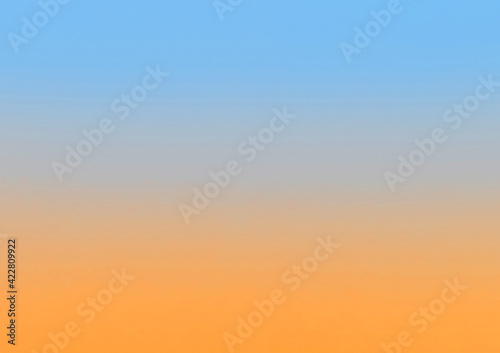 Twilight with orange gradient sunset and light blue sky background